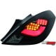 LAMPY TYLNE LED OPEL CORSA D 06-08 3D CZARNE / DYMIONE