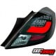 LAMPY TYLNE LED OPEL CORSA D 06-14 3D CZARNE / DYMIONE