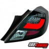 LAMPY TYLNE LED OPEL CORSA D 06-14 3D CZARNE / DYMIONE
